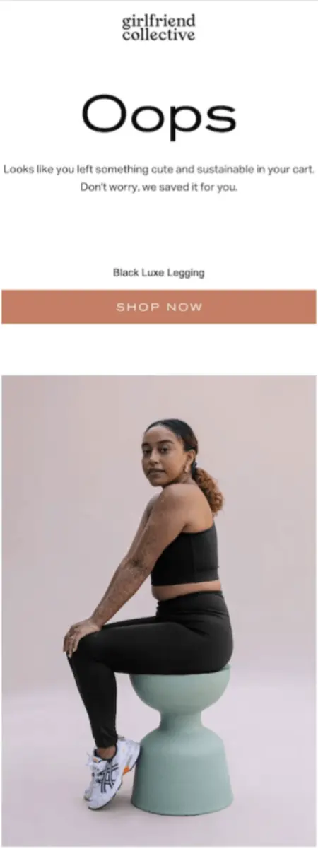 At the top, a large header reads, “Oops” in black text against a white background. Underneath is an image of a dark-skinned person sitting on a green bucket chair wearing a cropped black tank top and black leggings. They’re sitting sideways to the camera with their face turned toward the camera.